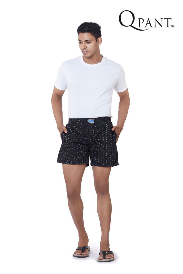 Model in black printed boxer shorts